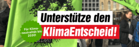Demo einer Klimademo. Darauf der Text "Supporte den KlimaEntscheid"